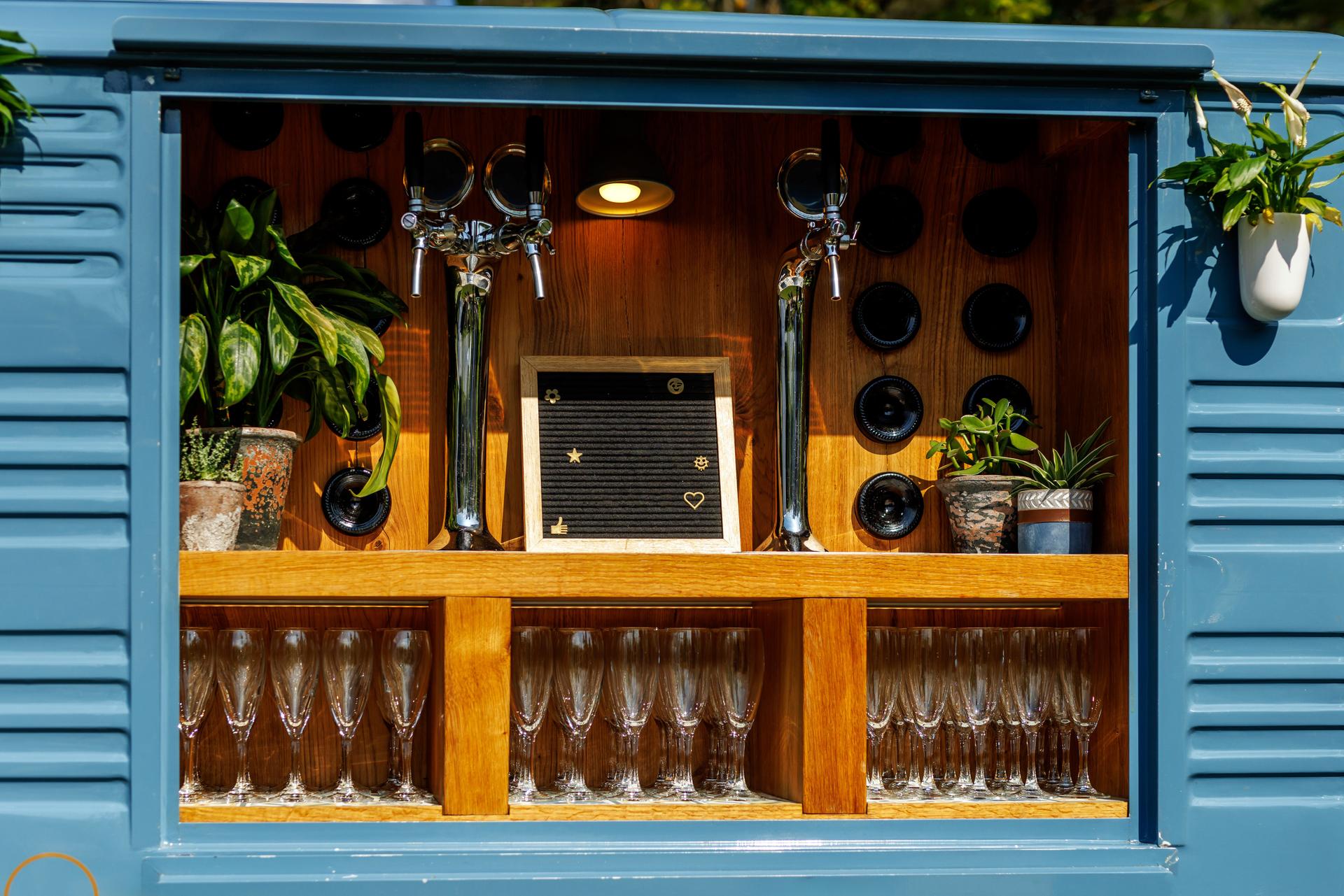 Mobile bar or tap trailer set up at an event.